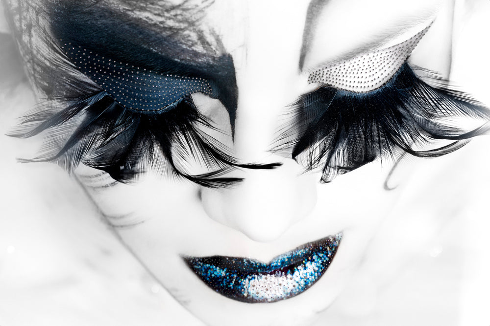 Lady with blue feather eyelashes