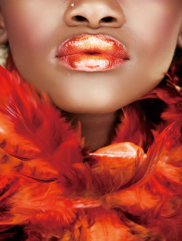 Beauty with red feather boa