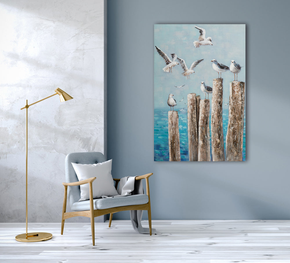 Painting Seagulls on Wooden Poles