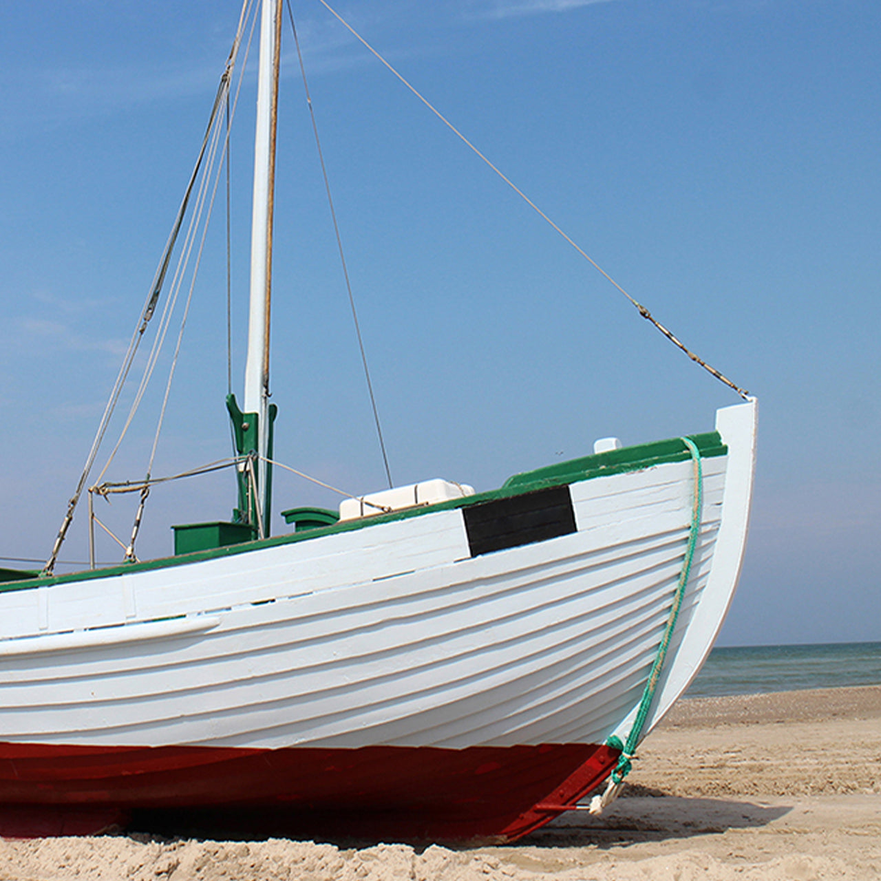 Alubild Kutter am Strand