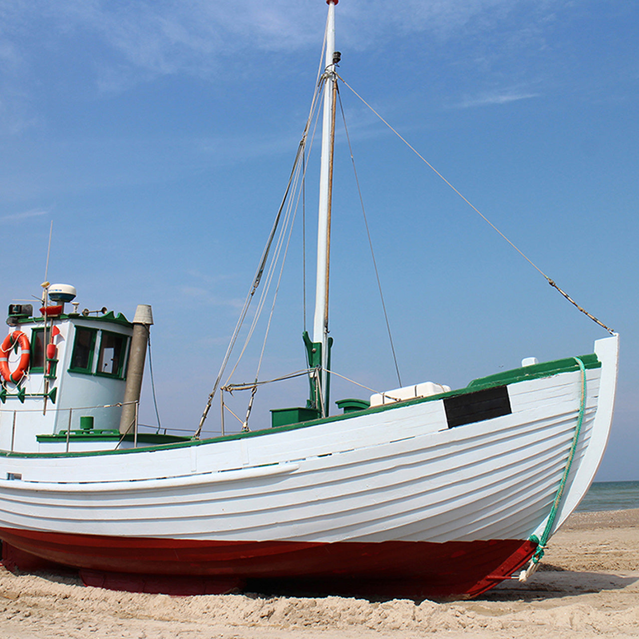 Canvas Print Kutter am Strand