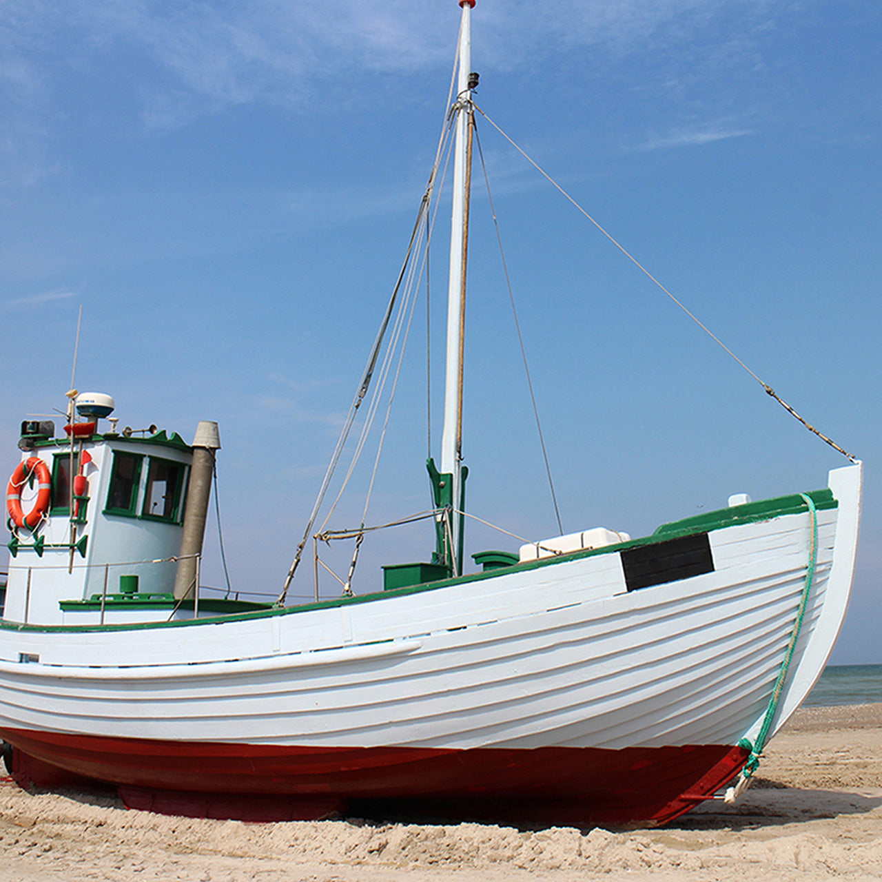 Canvas Print Kutter am Strand